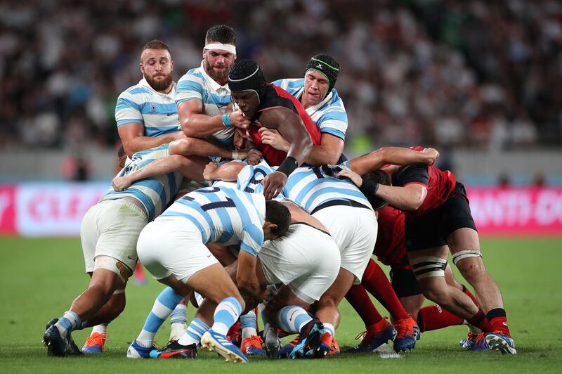 Maro Itoje of England gets tackled by Argentina at the Tokyo Stadium. Getty