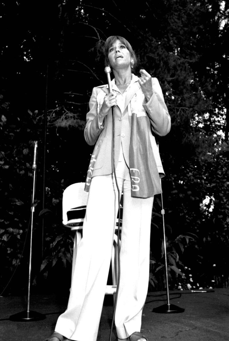 Jane Fonda, in a light blazer and white trousers, at the Era Benefit at activist Marlo Thomas's Home in 1978