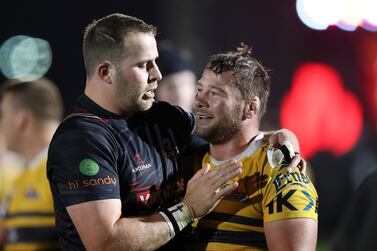 Exiles' Jaen Botes with Canes' Ruan Steenkamp after the game between the Dubai Exiles and the Dubai Hurricanes in the West Asia Premiership. The Sevens, Dubai. Chris Whiteoak / The National