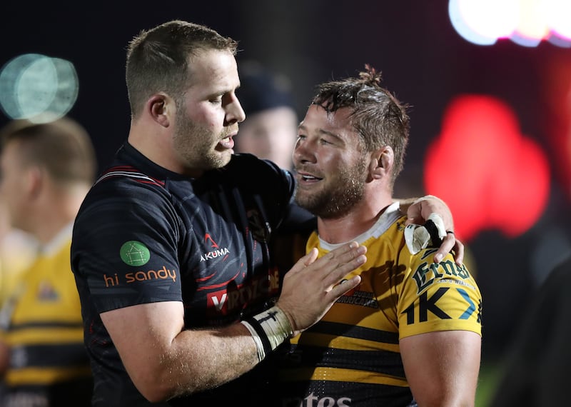 Dubai Exiles Jaen Botes with Ruan Steenkamp of Dubai Hurricanes after the West Asia Premiership game on March 1, 2024. The Exiles won 25-21. All images by Chris Whiteoak / The National
