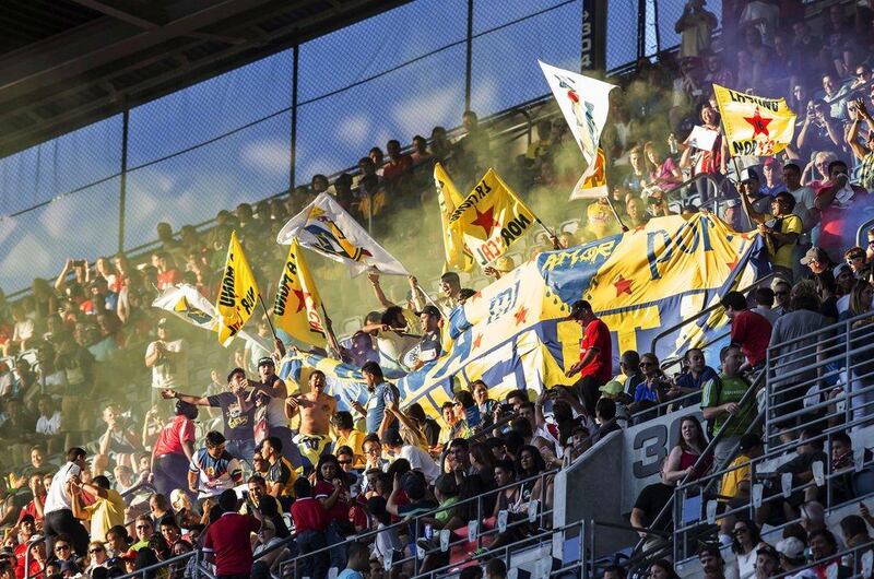 Supporters of Mexico's Club America, always a major draw in the US, cheer before the pre-season friendly against Manchester United on Friday in Seattle. Stephen Brashear / AFP