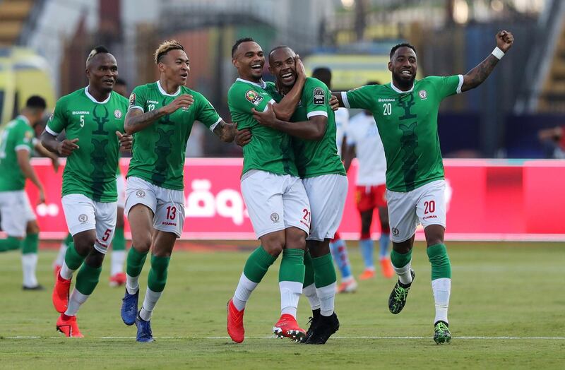 Soccer Football - Africa Cup of Nations 2019 - Round of 16 - Madagascar v DR Congo - Alexandria Stadium, Alexandria, Egypt - July 7, 2019  Madagascar's Ibrahim Amada celebrates scoring their first goal with teammates  REUTERS/Suhaib Salem     TPX IMAGES OF THE DAY