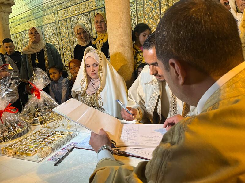 A Tunisian couple getting married at the Sid Sahbi mausoleum in Kairouan