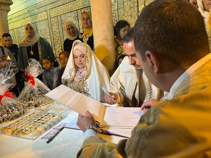 A Tunisian couple getting married at the Sid Sahbi mausoleum in Kairouan