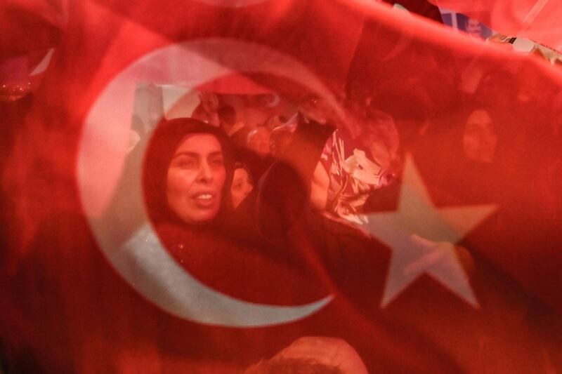 Supporters of the AKP wave Turkish national flags in Istanbul. AFP