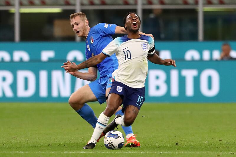 Tommaso Pobega of Italy challenges Raheem Sterling of England. Getty