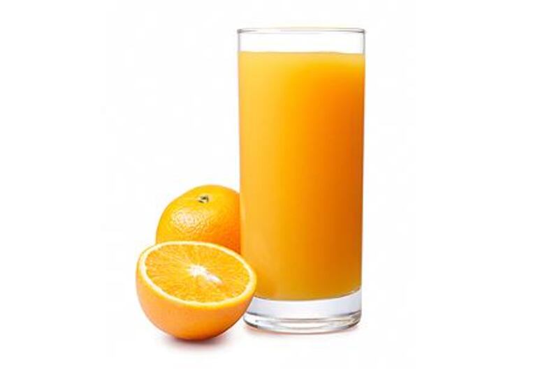 orange juice with oranges isolated on white