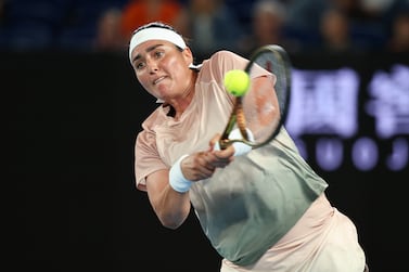 MELBOURNE, AUSTRALIA - JANUARY 17: Ons Jabeur of Tunisia plays a backhand in their round two singles match against Mirra Andreeva during the 2024 Australian Open at Melbourne Park on January 17, 2024 in Melbourne, Australia. (Photo by Cameron Spencer / Getty Images)