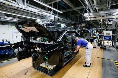 Workers assemble Volkswagen ID.5 electric cars at the company's Zwickau plant in Germany. Getty