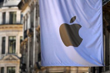 Apple's flag hangs from its UK headquarters in London. The company briefly surpassed a value of $2 trillion on Wednesday, regaining the position of the world's most valuable company. EPA