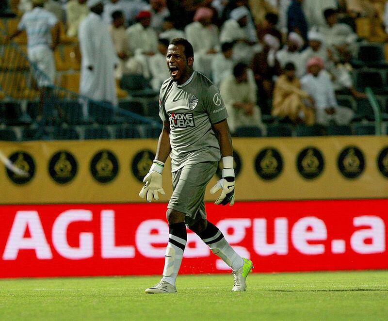 Al Ahli goalkeeper Majed Naser injured his Achilles in the opening game of the 2013/14 season against Dubai. Satish Kumar / The National