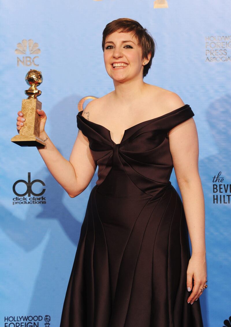Actress Lena Dunham, winner of Best Actress in a Television Series (Musical or Comedy) for "Girls," poses in the press room during the 70th Annual Golden Globe Awards held at The Beverly Hilton Hotel on January 13, 2013 in Beverly Hills, California.   Kevin Winter/Getty Images/AFP== FOR NEWSPAPERS, INTERNET, TELCOS & TELEVISION USE ONLY ==
 *** Local Caption ***  252350-01-09.jpg