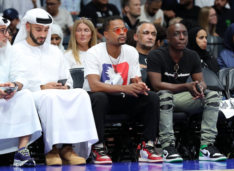 Former France footballer Patrice Evra watches from court side. Chris Whiteoak / The National