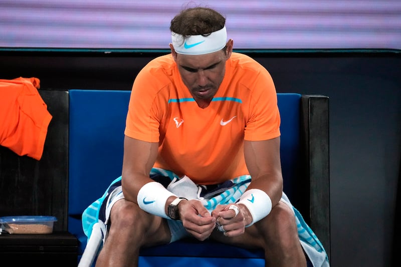 Rafael Nadal sits in his chair between changeovers during his second round match against Mackenzie McDonald. AP