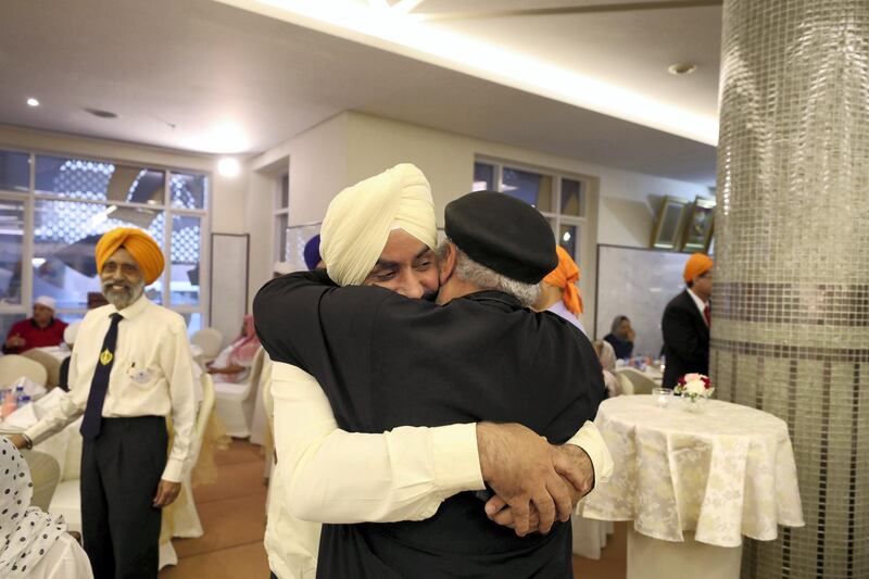 Dubai, United Arab Emirates - May 15, 2019: People take part in a multi faith Iftar at Gurunanak Darbar Sikh Gurudwara. Wednesday the 15th of May 2019. Jebel Ali, Dubai. Chris Whiteoak / The National