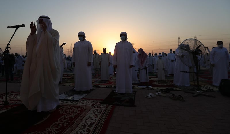 Emirate cleric Aref Sheikh leads the Eid Al Fitr prayer at Nad Al Hammar Eid musallah in Dubai. EPA