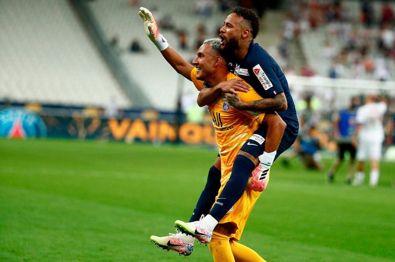 Neymar with goalkeeper Keylor Navas. AFP