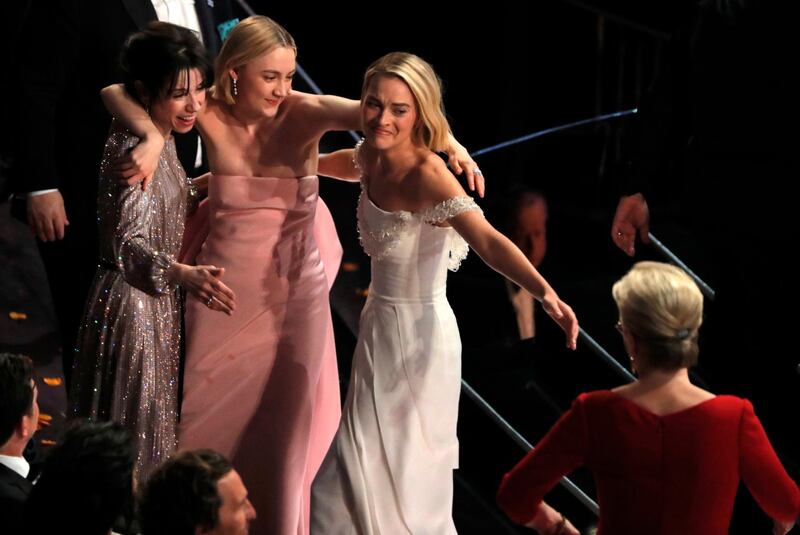 It looks like Margot Robbie's getting emotional merely at the thought of Meryl talking to her (but she's really reacting after Frances McDormand's Best Actress acceptance speech). Reuters