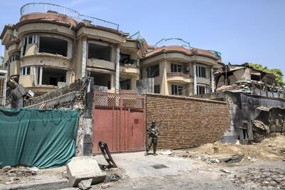 The building of Counterpart International two weeks after its attack in Kabul. The outside wall has already been rebuilt, the building is destroyed. 