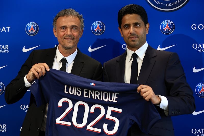 New PSG manager Luis Enrique, left, with club president Nasser Al Khelaifi on Wednesday, July 5, 2023. AP