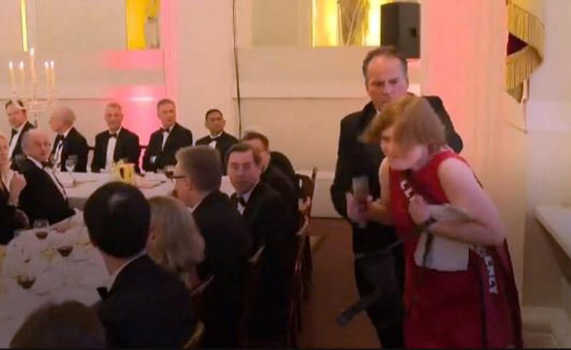 Tory MP Mark Field Physically Removes Protester From Philip Hammond Speech. Screen grab