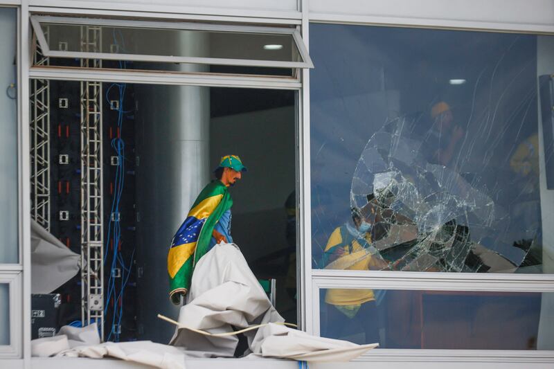 Some of the demonstrators ransacked offices and smashed windows. Reuters