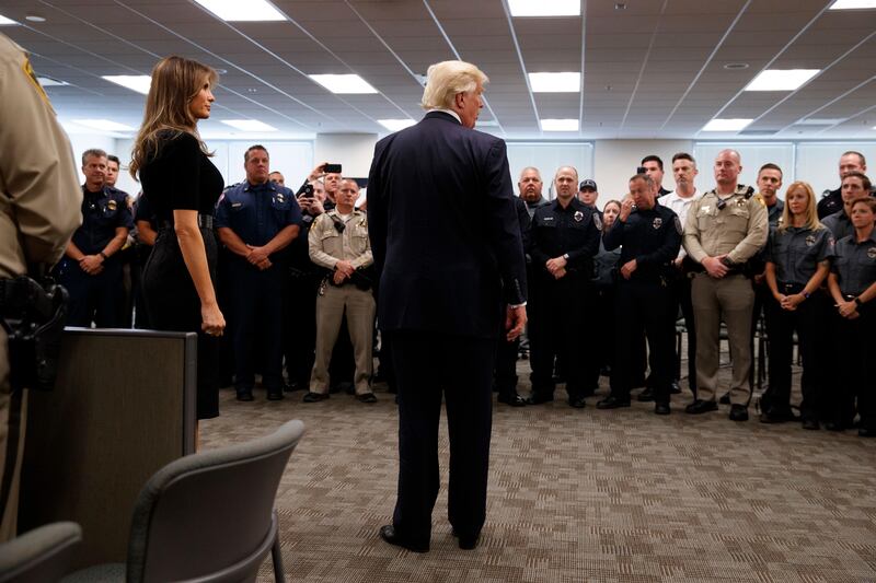 President Donald Trump and first lady Melania Trump meet with first responders at the Las Vegas Metropolitan Police Department in Las Vegas. Evan Vucci / AP Photo