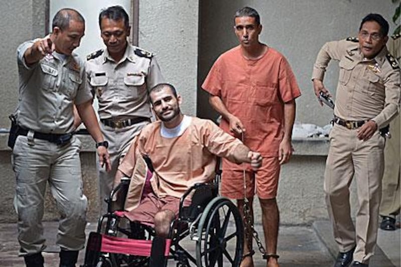 Saeed Moradi, 29, left, and Mohammed Khazaei, 43, were jailed in Thailand today. Moradi had his legs blown off in his failed bomb plot in Bangkok.