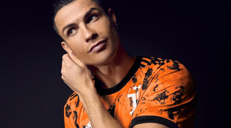 Cristiano Ronaldo models the new Juventus kit. Courtesy Juventus / Twitter