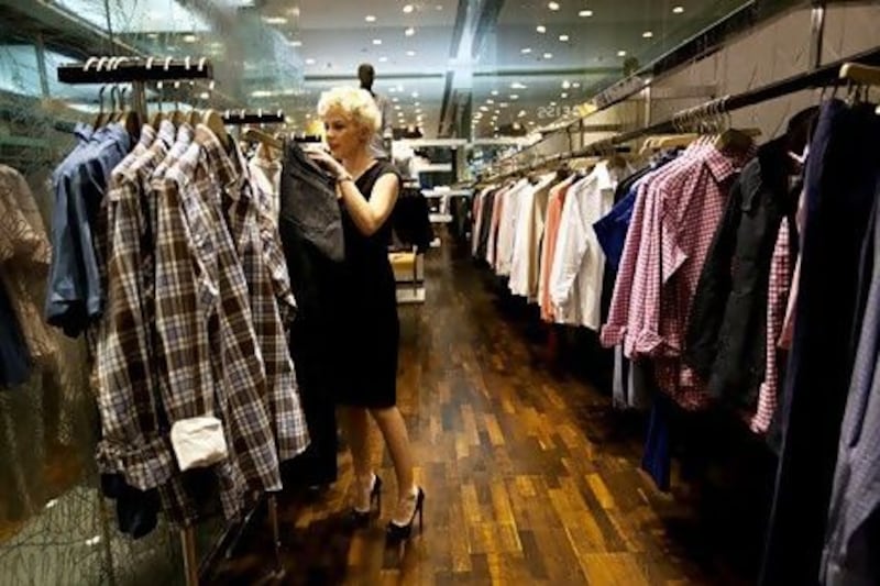 Personal stylist Kelly Lundberg shops at Reiss in Dubai Mall on February 19, 2012. Christopher Pike / The National