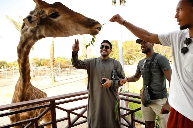 Liverpool's Gini Wijnaldum and Virgil Van Dijk at Saif Belhasa's zoo in Dubai. Courtesy Saif Rubie / Twitter