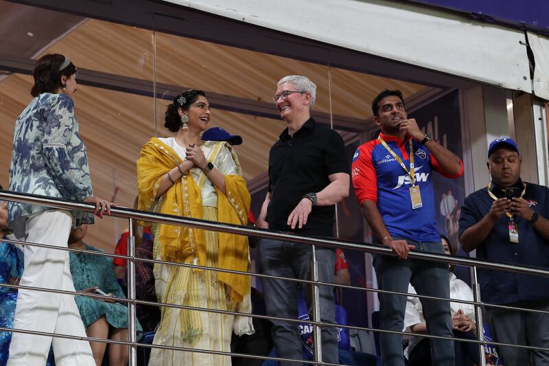 Apple CEO Tim Cook, centre, and actress Sonam Kapoor, second left, during the IPL match between Delhi Capitals and Kolkata Knight Riders at the Arun Jaitley Stadium in New Delhi on Thursday, April 20, 2023. Sportzpics for IPL