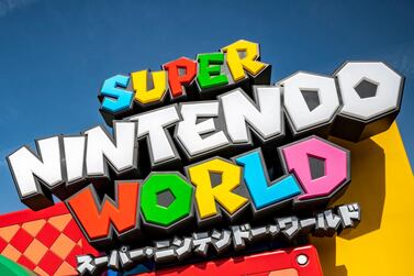 This picture taken on March 17, 2021, shows a logo of the Super Nintendo World during a media preview at Universal Studios Japan in Osaka. / AFP / Philip FONG