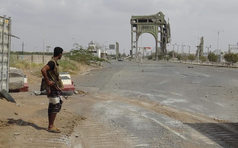 A member of the Yemeni pro-government forces stands at the eastern entrance of the port city of Hodeidah. AFP