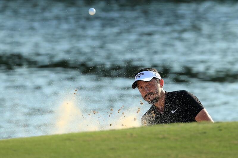 Mike Lorenzo-Vera of France plays a bunker shot on the 17th. Getty