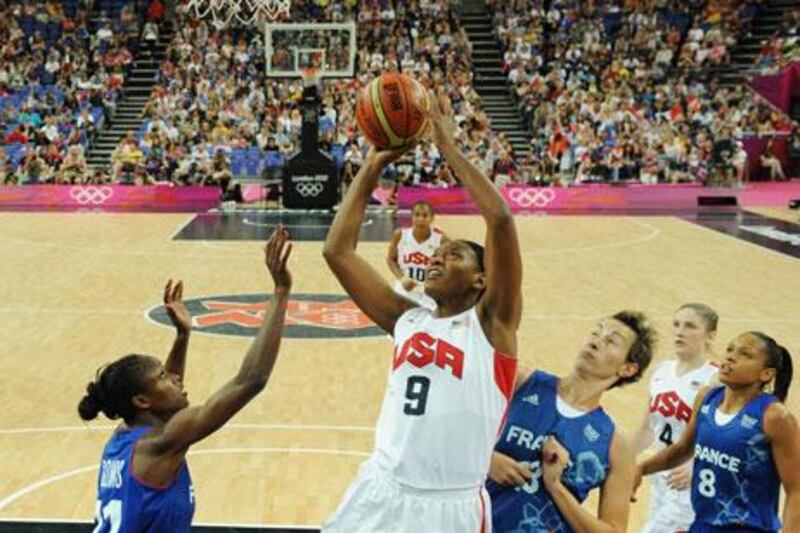 Asjah Jones jumps to score against France during the London 2012 Olympic basketball finals