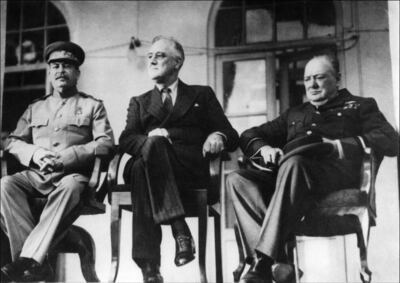 Soviet leader Josef Stalin, left, US president Franklin Roosevelt, centre, and British prime minister Winston Churchill at a meeting in Tehran on November 28, 1943. STF / AFP