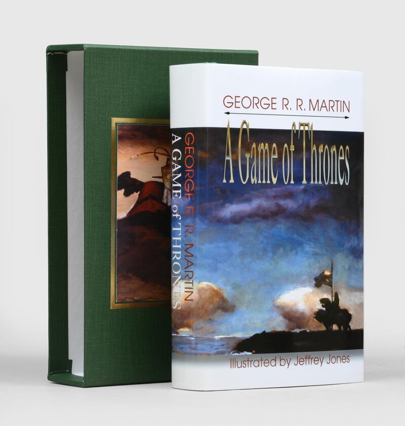 A deluxe, signed limited-edition of George R R Martin’s 'A Song of Ice and Fire: A Game of Thrones; A Clash of Kings; A Storm of Swords; A Feast For Crows; A Dance of Dragons' – one of only 52 lettered sets signed by the author and illustrators with an original drawing in each volume – is for sale for £27,500 (Dh129,000). Peter Harrington