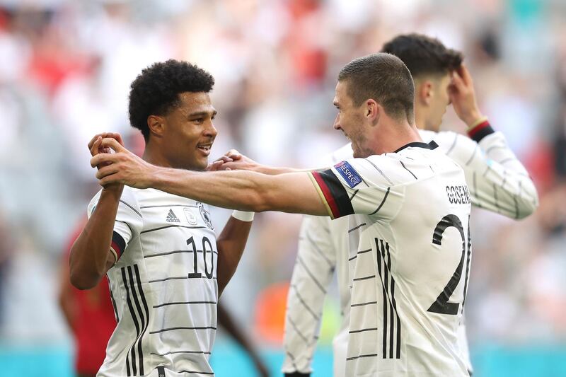 Robin Gosens of Germany celebrates with Serge Gnabry after scoring their side's fourth goal  in the 4-2 win against Portugal. Getty