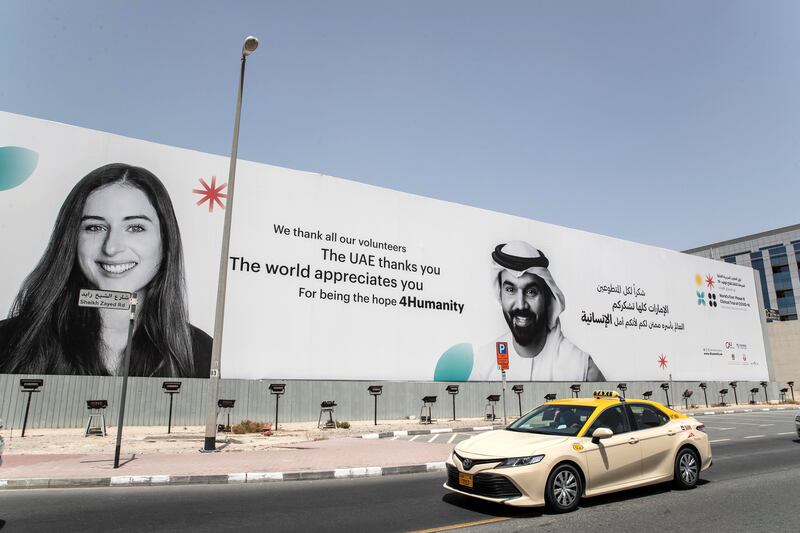 DUBAI, UNITED ARAB EMIRATES. 31 AUGUST 2020. STANDALONE. Billboard along Sheikh Zayed Road near the Business Bay Metro station in the direction abu Dhabi bound thanking the COVID Vaccine volunteers for the Phase 3 trials conducted in the UAE. (Photo: Antonie Robertson/The National) Journalist: None. Section: National.