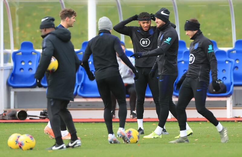 England players, including Joe Gomez and Harry Kane, take part in a training session. PA