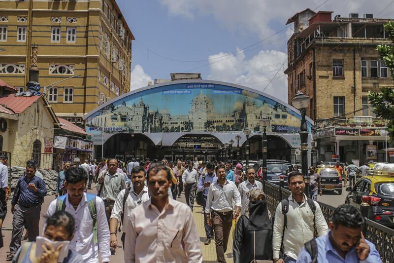 Commuters exit Masjid Bunder train station in Mumbai, India, on Thursday, Aug. 29, 2019. Credit analysts are keeping a watchful eye on signs of stress in Indian household debt after unemployment rose to a 45-year high and as lenders grapple with the worst soured debt levels of any major economy. Photographer: Dhiraj Singh/Bloomberg