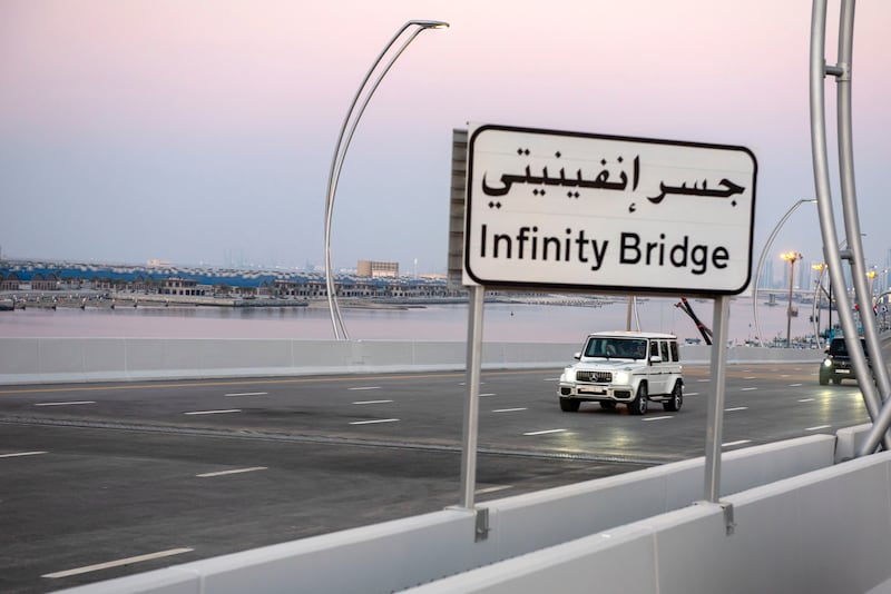 Sheikh Mohammed drives on Infinity Bridge.