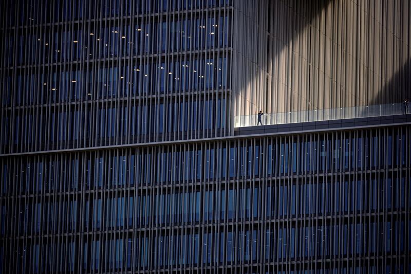 An employee talks on a phone at an office building in Seoul, South Korea. Kim Hong-Ji/Reuters