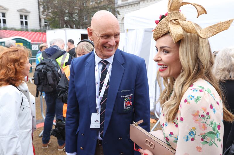 Former Olympic swimmer Duncan Goodhew and opera singer Katherine Jenkins arrive at the pageant. PA