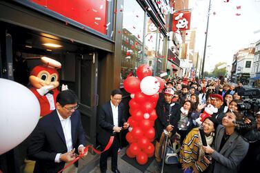 Jollibee CEO Ernesto Tanmantiong opens the first Jollibee restaurant in the UK. Reuters