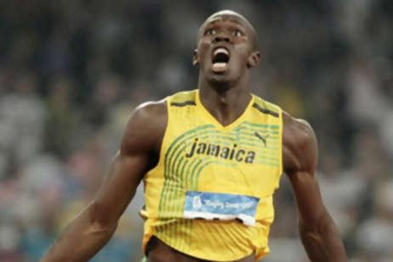 Jamaica's Usain Bolt celebrates winning the gold last night.