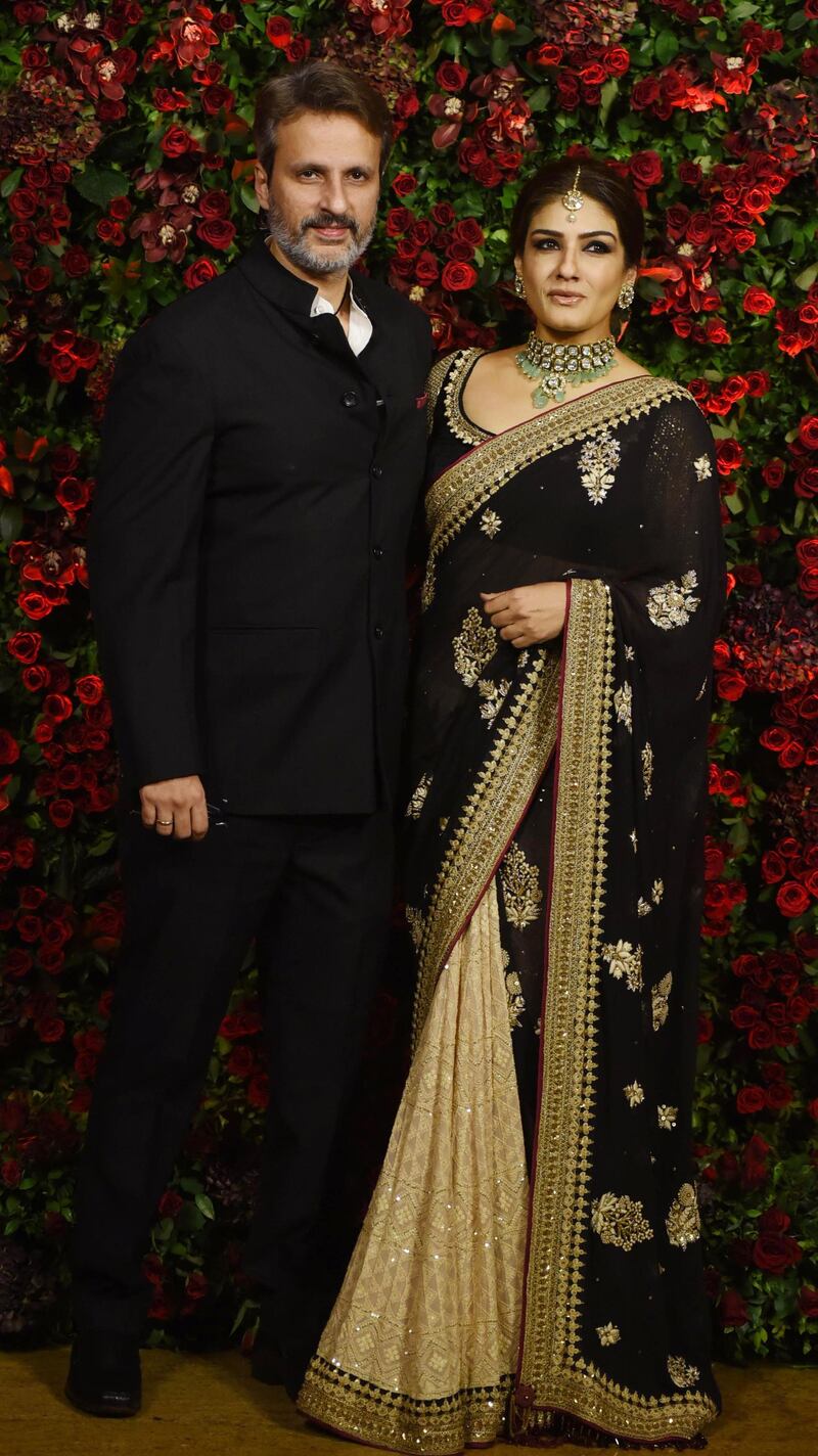 Raveena Tandon with her husband Anil Thadani. AFP