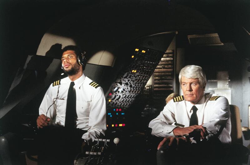 Kareem Abdul-Jabbar, Frank Ashmore, and Peter Graves in Airplane! (1980) IMDb