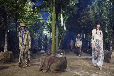 Christian Dior's Women's Spring-Summer 2020 Ready-to-Wear collection was showcased in a living forest. AFP